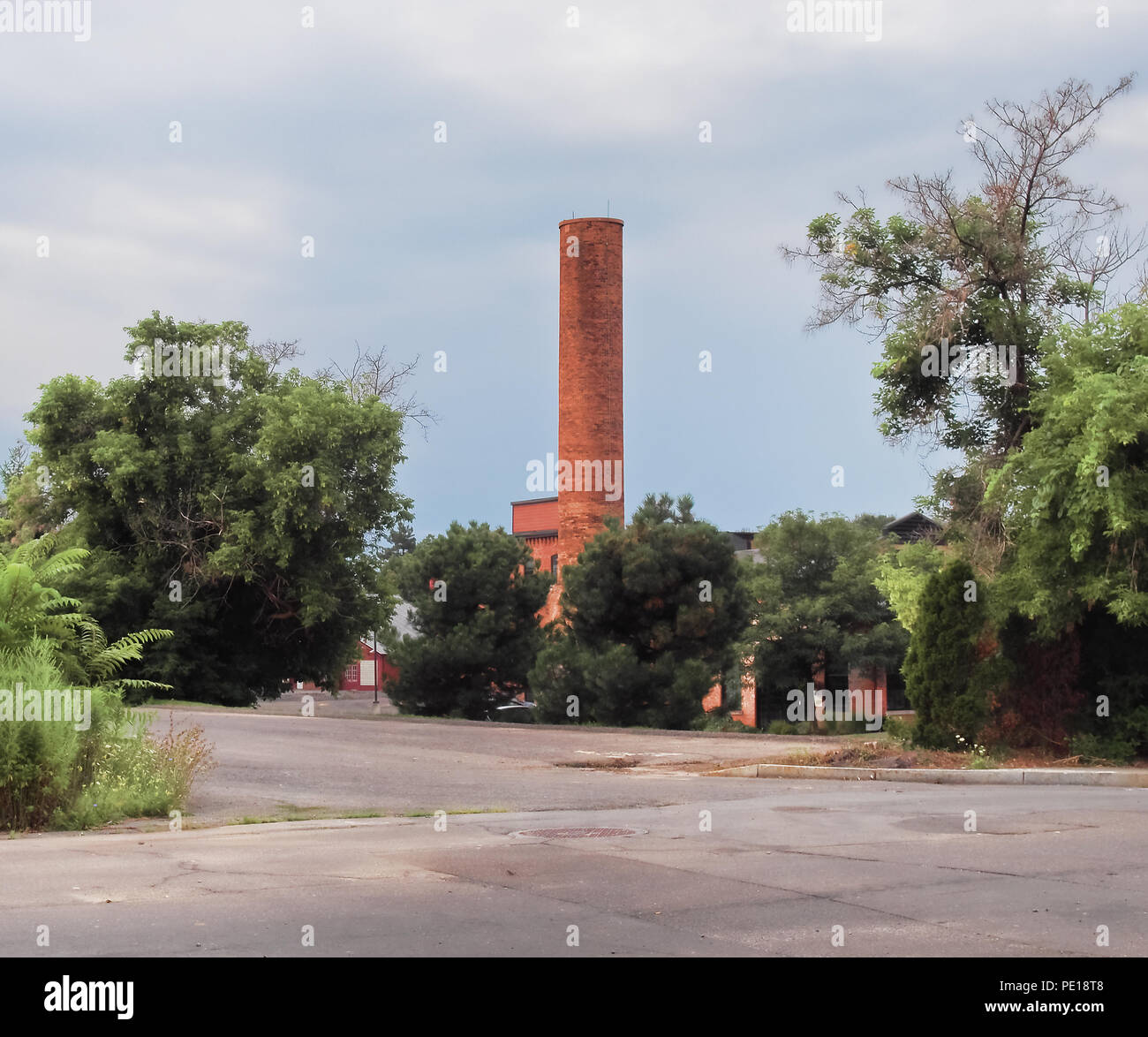 Renoviert, gehobene Nachbarschaft in eine alte Fabrik Bezirk mit Schornstein noch für Historisches Ambiente Stockfoto