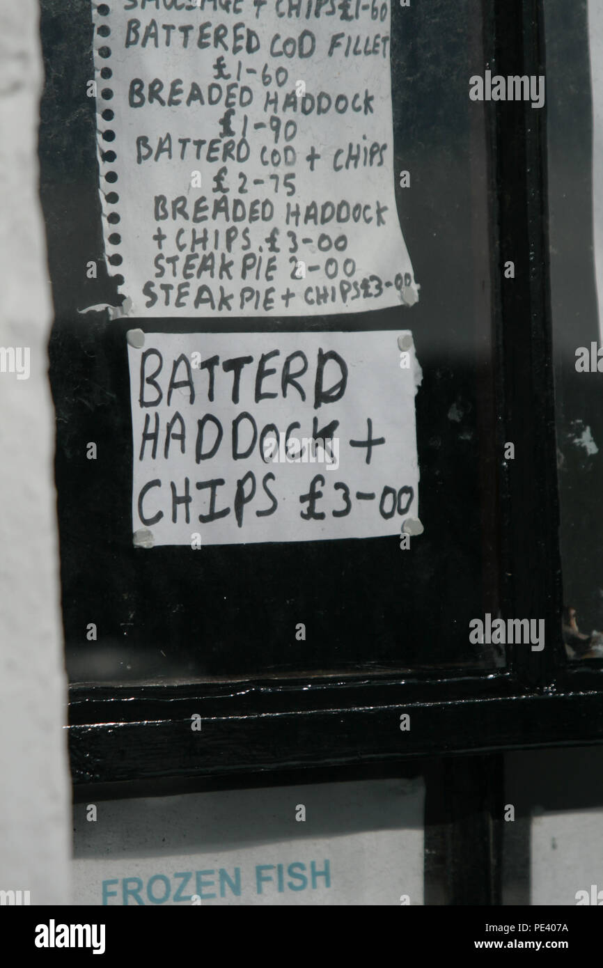 Zerschlagene Schellfisch und Chips falsch geschriebene handschriftliche Zeichen, Dumfries und Galloway Stockfoto
