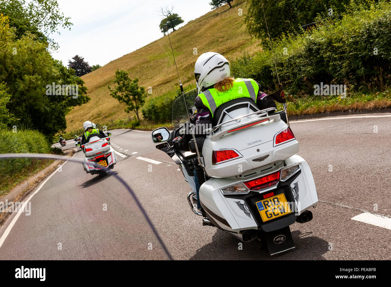 Honda Goldwing Motorräder und Fahrer auf der Straße in der Derbyshire Peak District. Stockfoto