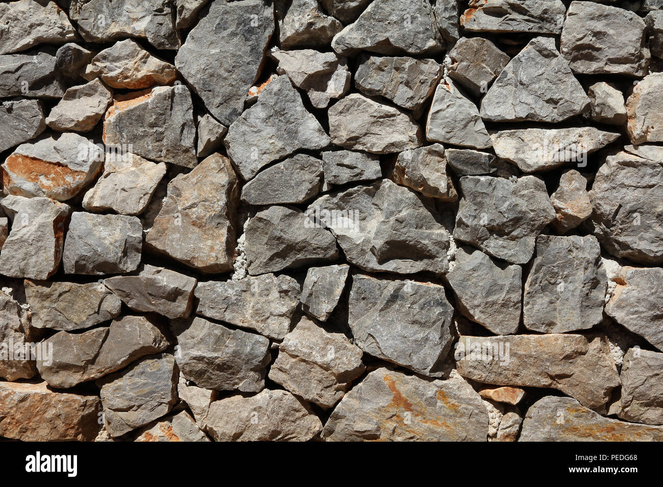 Basalt wand hintergrund - stein Wand Muster Stockfoto