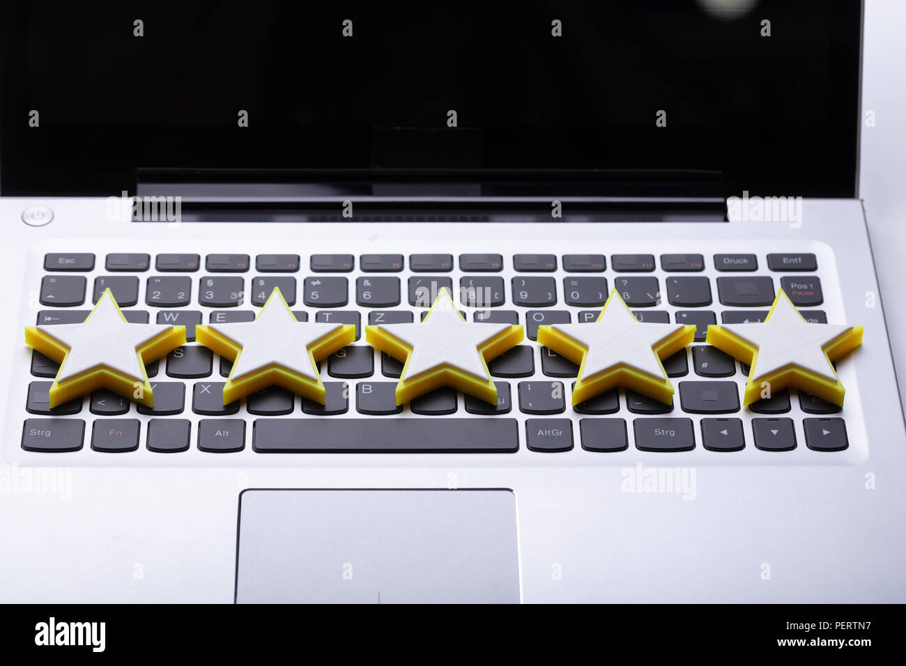 In der Nähe von Fünf Sternen Symbol auf Laptop Tastatur Stockfoto