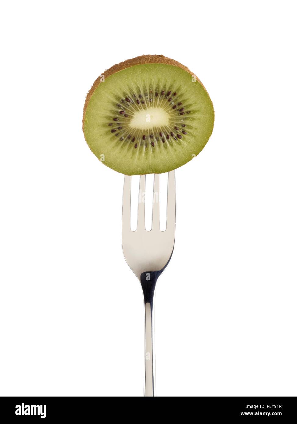 Kiwi in der Hälfte auf eine Gabel. Stockfoto
