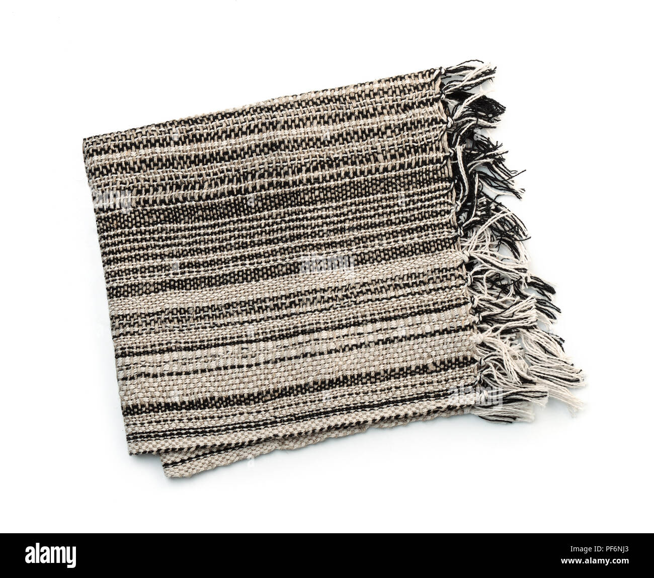 Blick von oben auf die Serviette gefaltet handgefertigte Leinen isoliert auf weißem Stockfoto