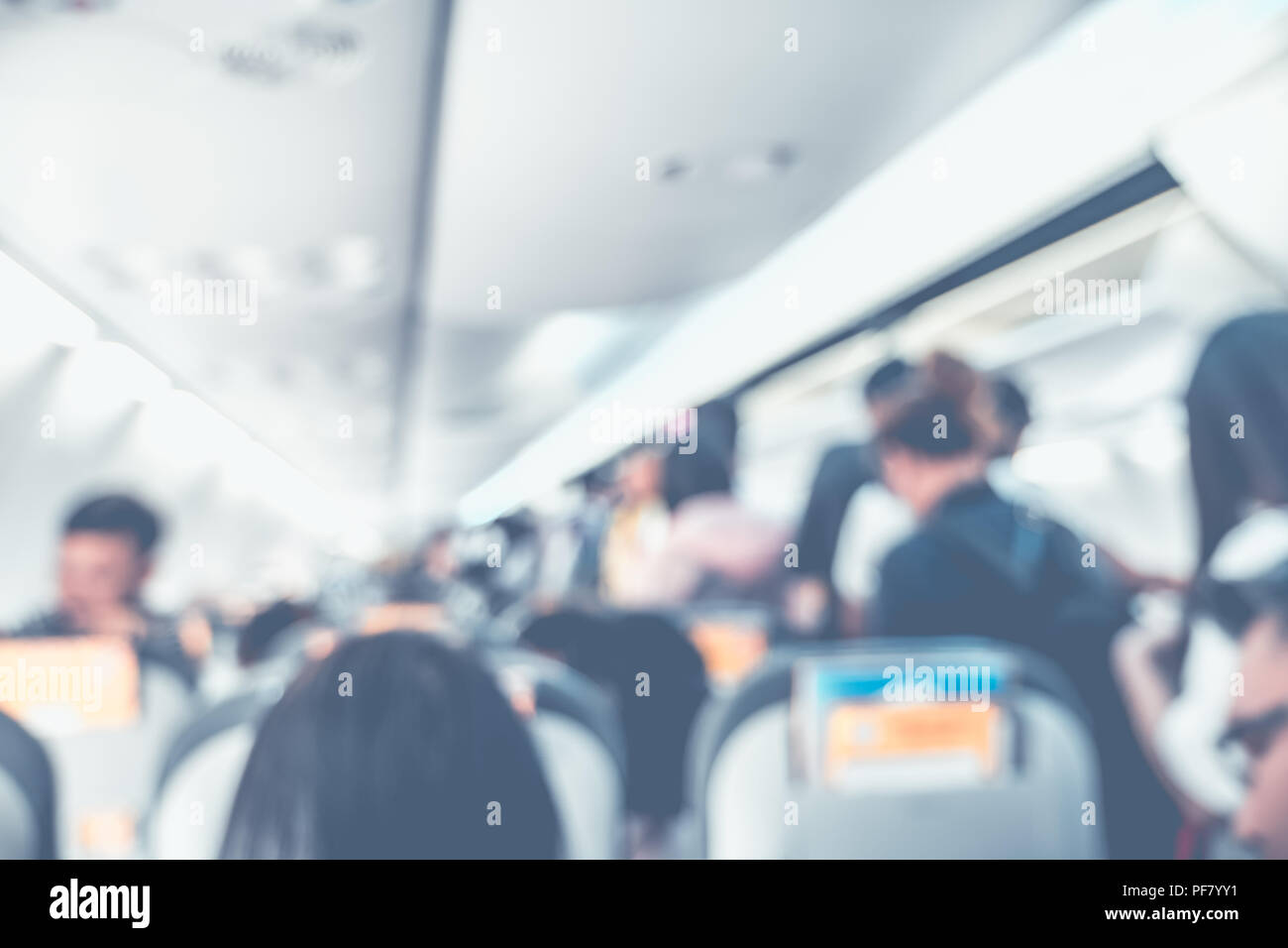 Blur Hintergrund Passagier auf Flugzeugkabine Stockfoto