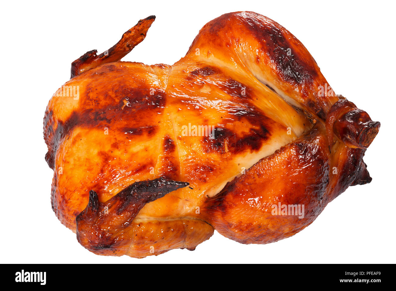 Köstliche goldene knusprige Haut Hähnchen vom Grill im Ofen auf weißem Hintergrund, Ansicht von