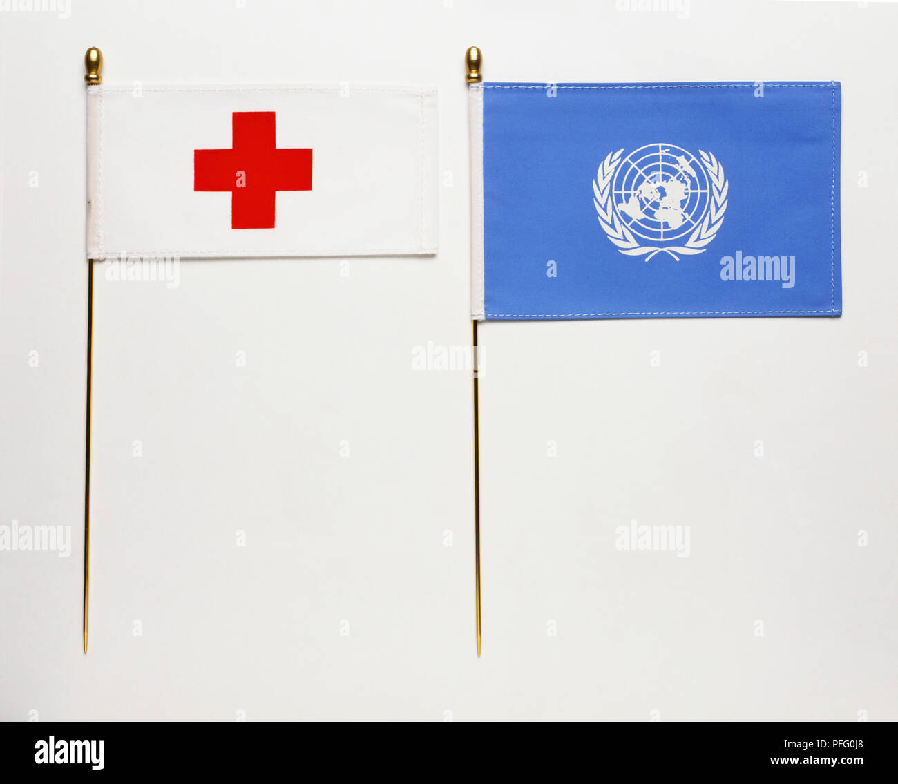 Flags of the Red Cross, and the United Nations Stockfoto