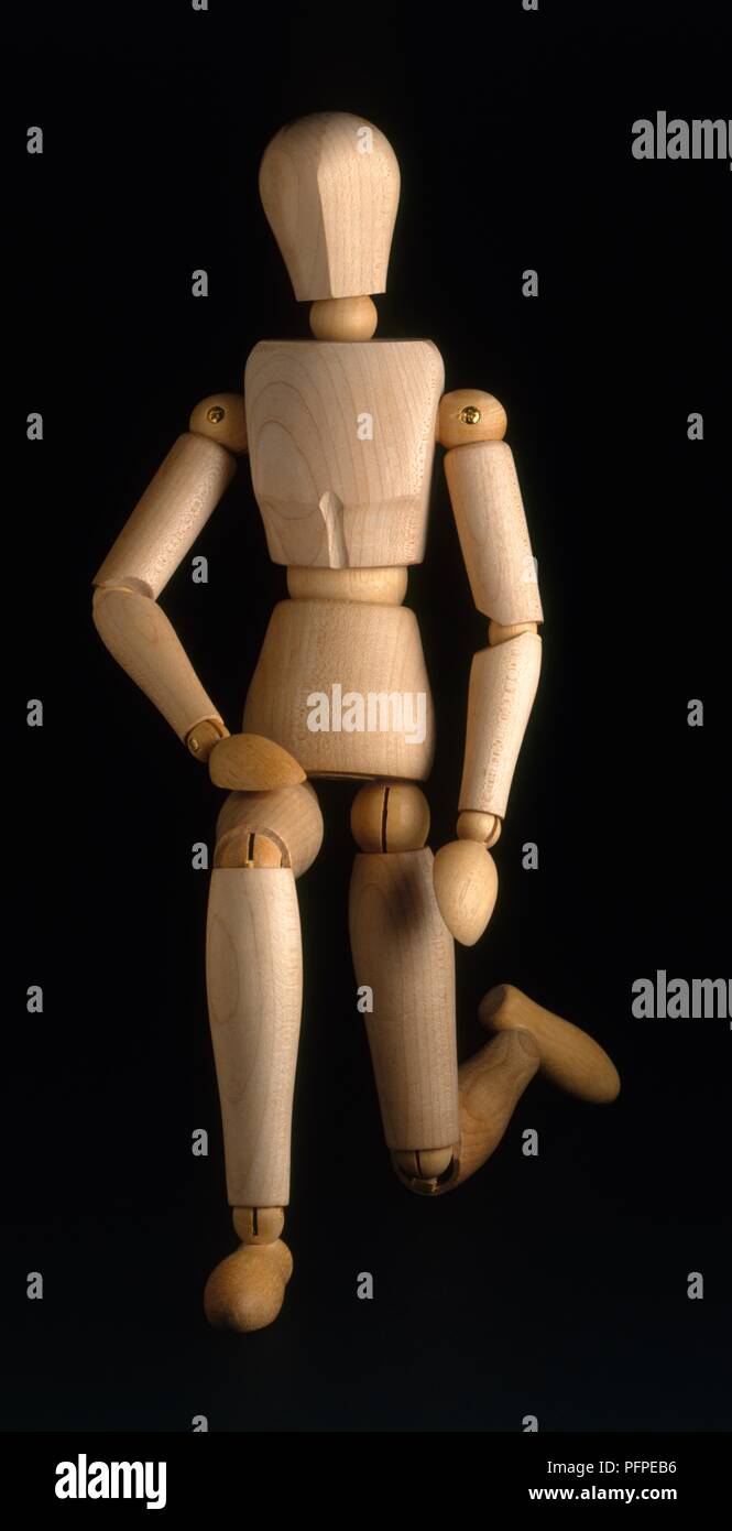 Holz- artikuliert artist Mannequin, kniend Stockfoto