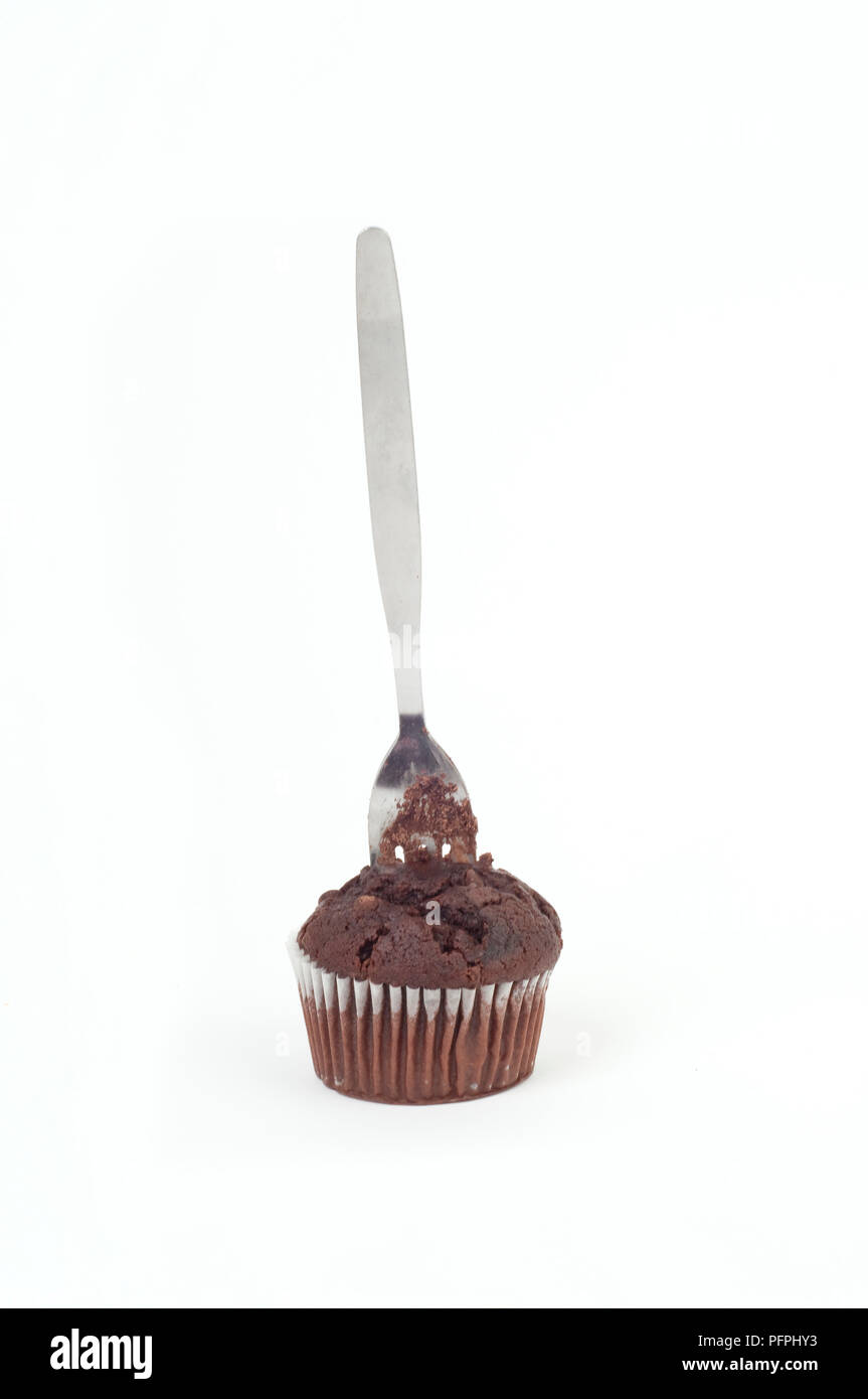 Schokolade Gabel in eine Schokolade muffin Stockfoto