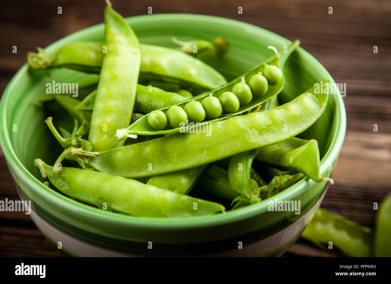 Frische grüne Erbsen pods closeup Foto Stockfoto