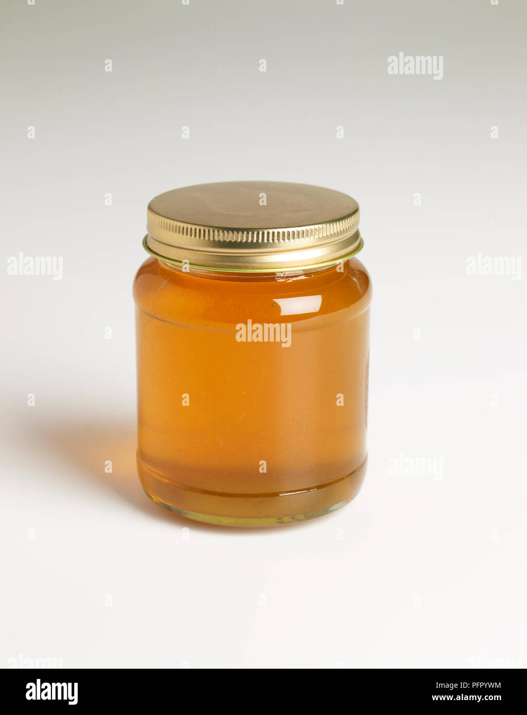 Honig im Glas Stockfoto