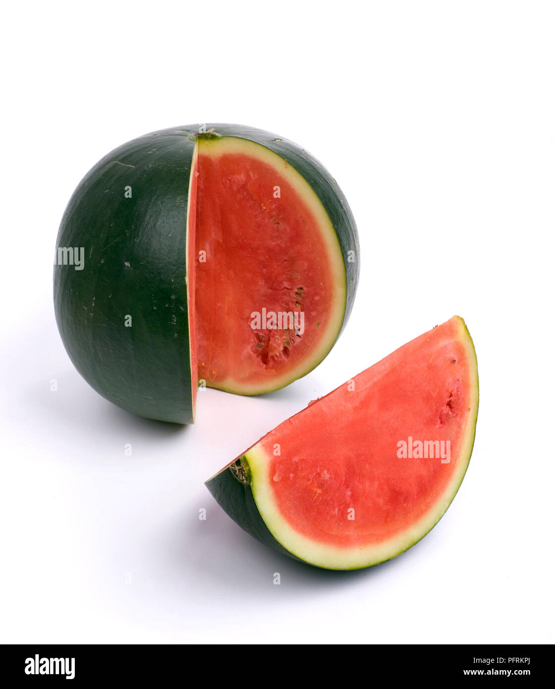 Wassermelone mit einem Viertel Schnitt entfernt Stockfoto