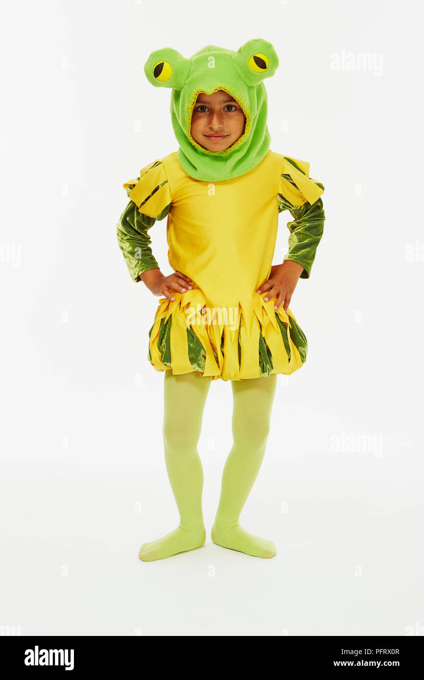 Junge verkleidet als frong Prinz in gelben und grünen Kostüm Stockfoto