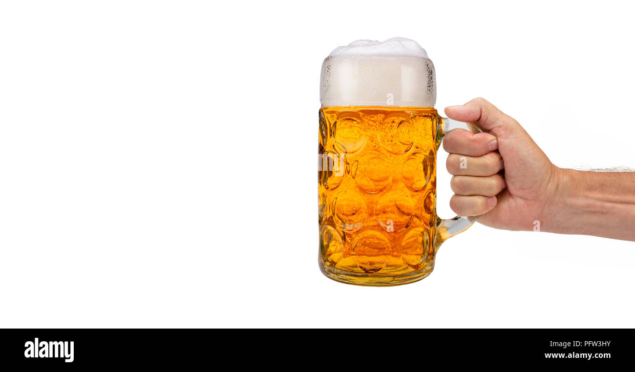 Isolierte Bierkrug in der Hand auf dem Oktoberfest in München. Stockfoto