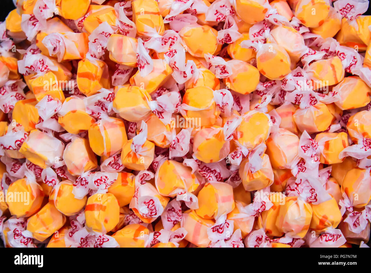 Wickelte Orange Candy Stockfoto
