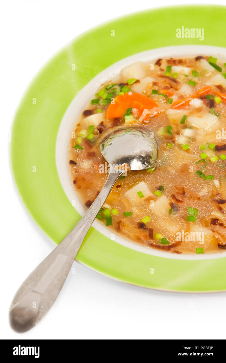 Mahlzeit in Porzellan - frische Suppe aus Gemüse mit Zwiebeln faltenpartie Stockfoto