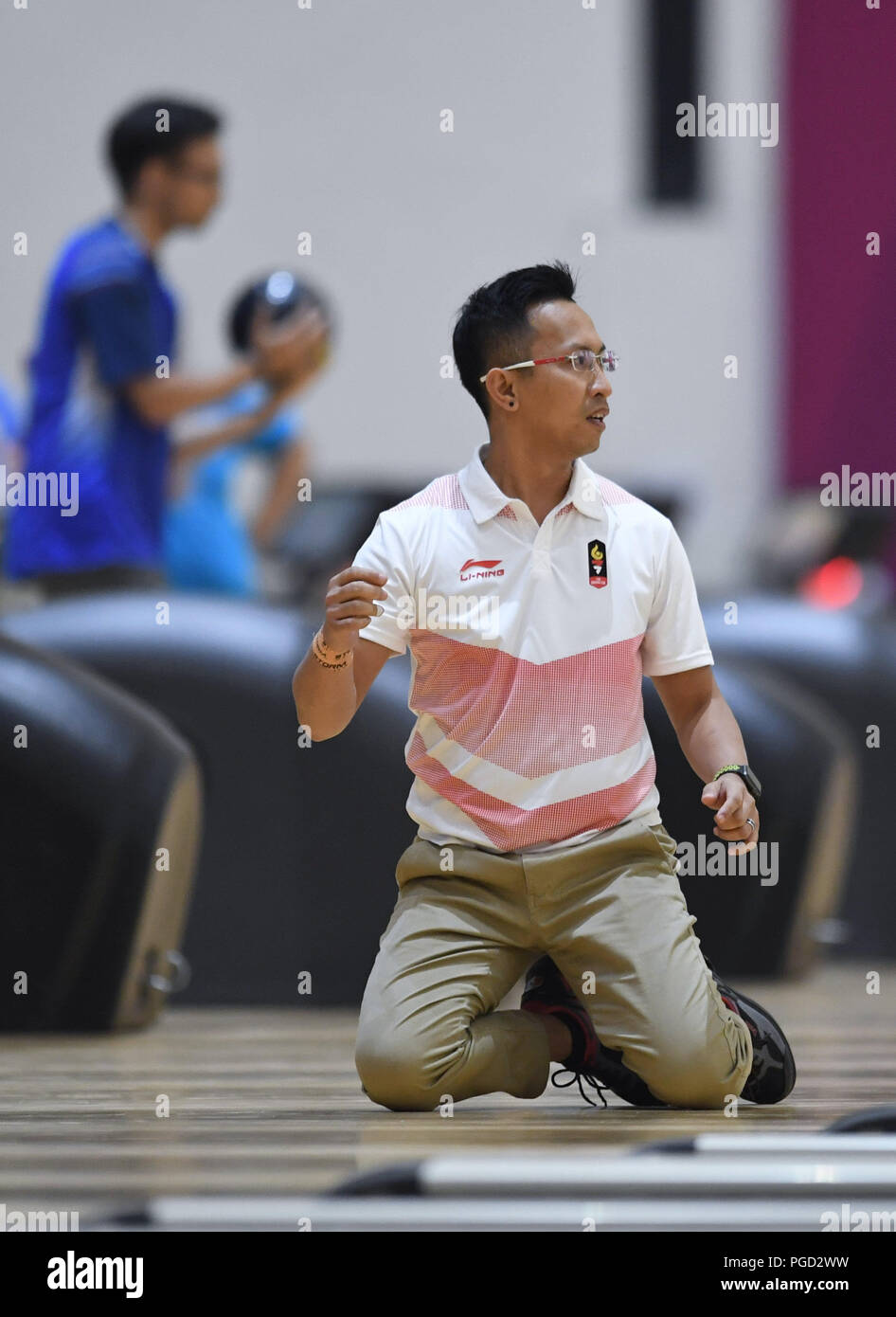 Palembang, Indonesien. 25 Aug, 2018. Ryan Leonard Lalisang Indonesiens konkurriert während Team Bowling Herren von sechs Ereignis am 18. asiatischen Spiele in Palembang, Indonesien, Aug 25., 2018. Credit: Liu Ailun/Xinhua/Alamy leben Nachrichten Stockfoto