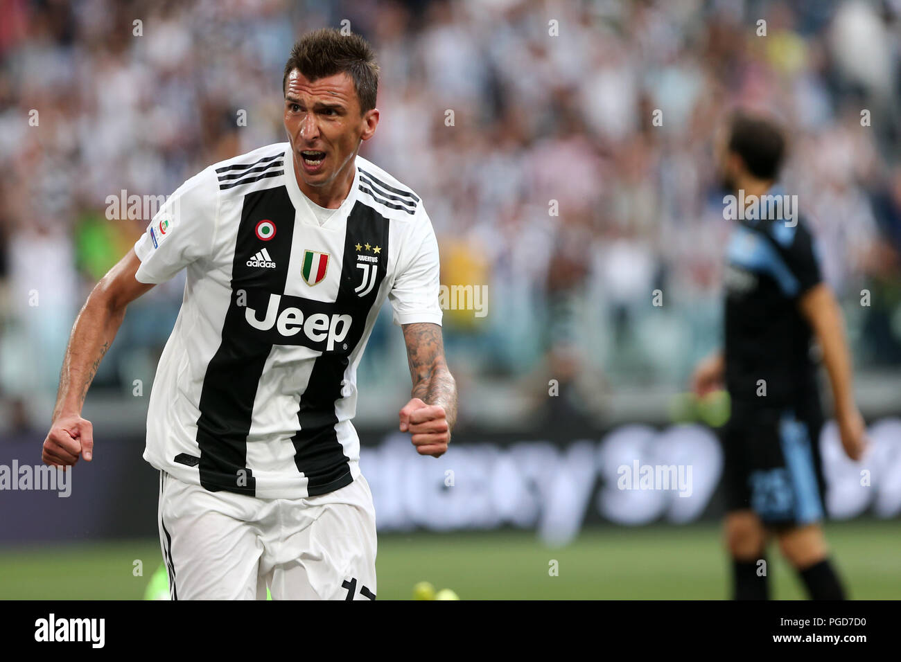 Torino, Italien. 25 August, 2018. Mario Mandzukic von Juventus Turin FC feiern, nachdem er ein Ziel während der Serie ein Fußballspiel zwischen FC Juventus und SS Lazio. Credit: Marco Canoniero/Alamy Live News Credit: Marco Canoniero/Alamy leben Nachrichten Stockfoto