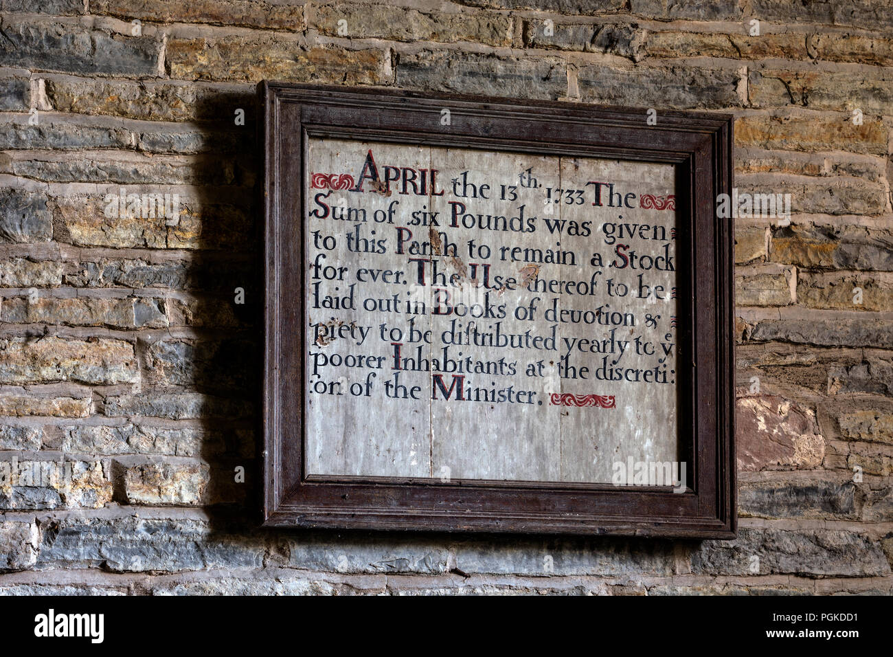 Schlechte Nächstenliebe Zeichen in die Kirche St. Michael, Churchill, Worcestershire, England, Großbritannien Stockfoto