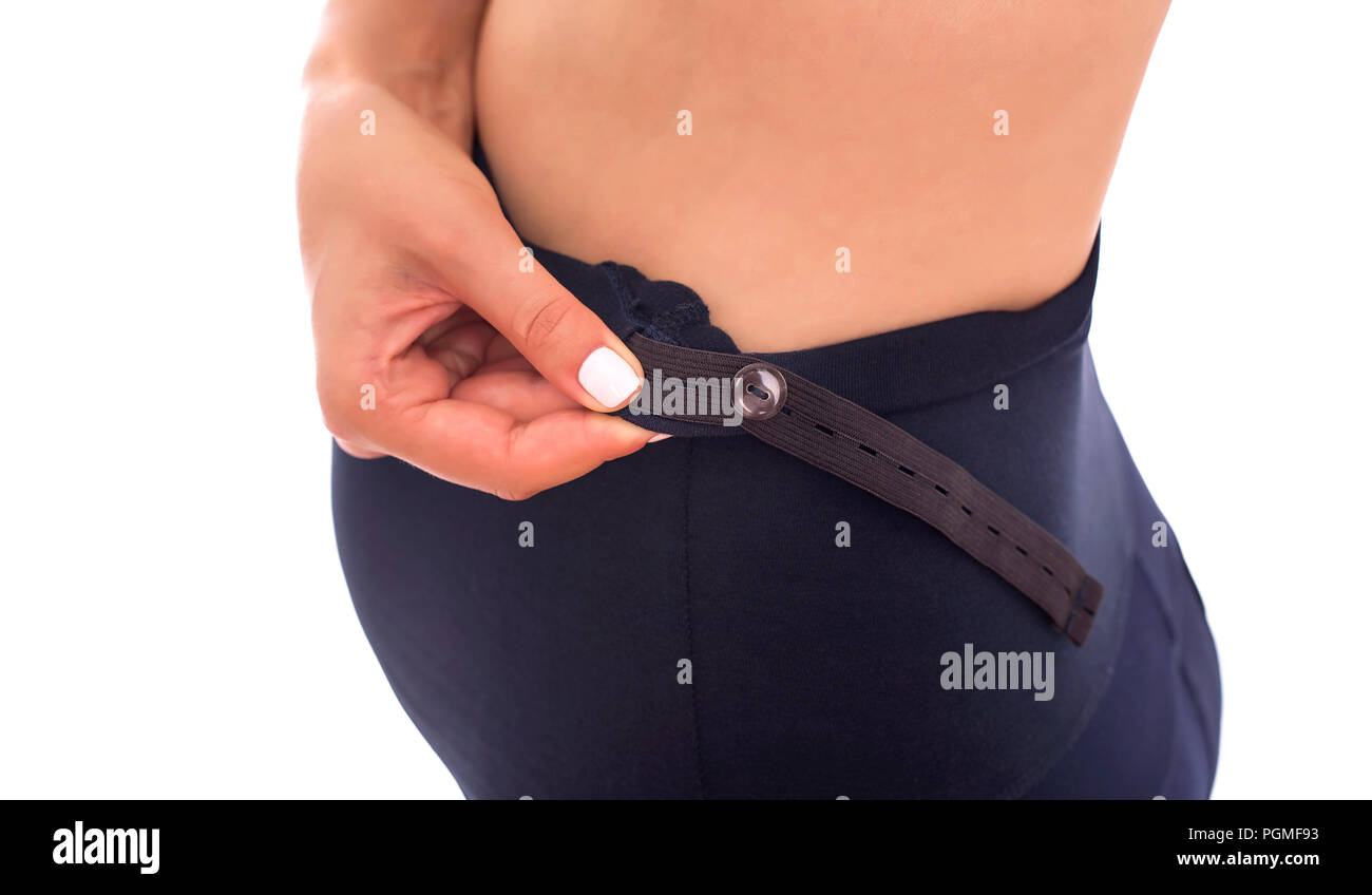 Hosen für schwangere Frauen. Man kann sehen das elastische Band, die Taille passt. Stockfoto