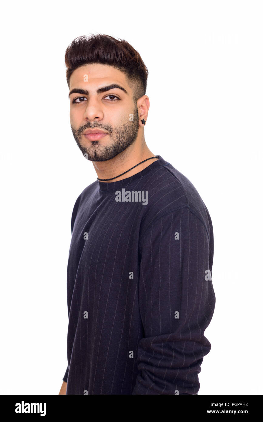 Studio shot der jungen schönen Indischen Mann gegen Weiße isoliert Stockfoto