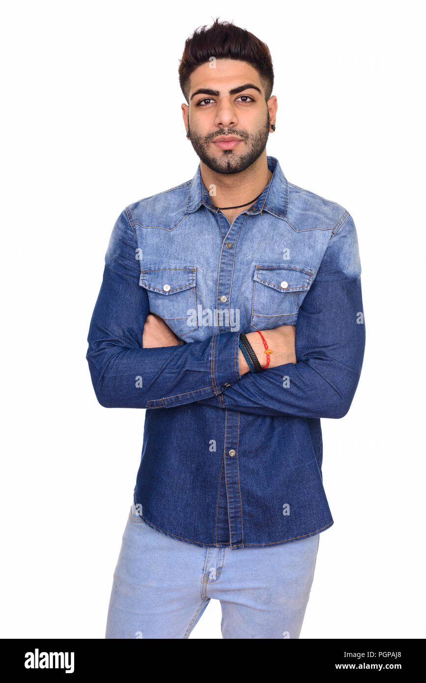 Studio shot der jungen schönen Indischen Mann gegen Weiße isoliert Stockfoto