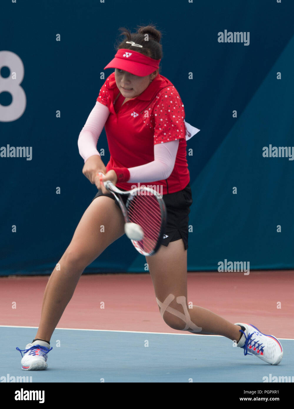 Palembang. 29 Aug, 2018. Yu Yuanyi von China konkurriert bei der einzigen Soft Tennis Frauen Viertelfinale am 18 Asian Games 2018 in Palembang, Indonesien am 12.08.29., 2018. Credit: Veri Sanovri/Xinhua/Alamy leben Nachrichten Stockfoto