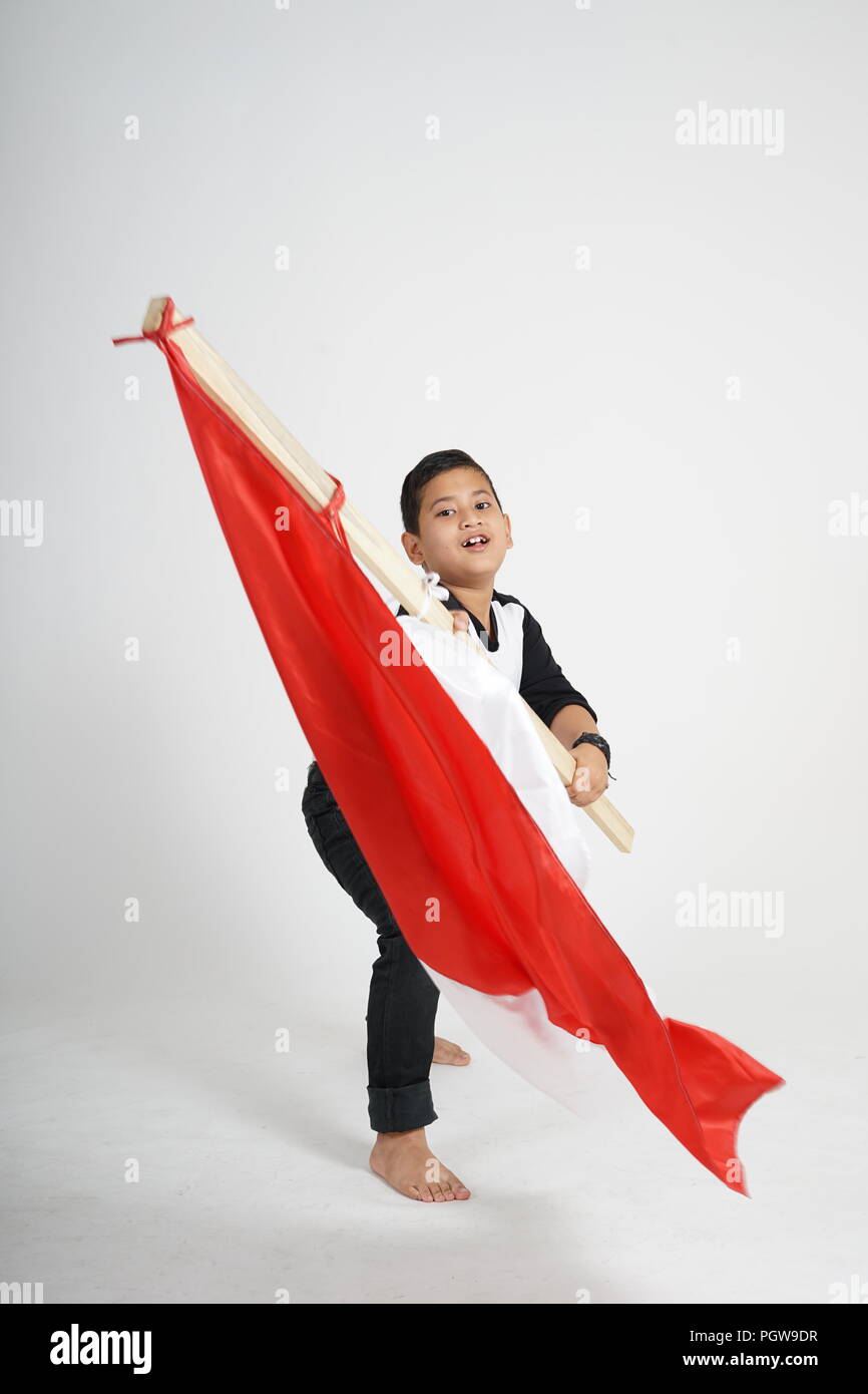 Junge mit indonesischen Flagge Erbauer Stockfoto