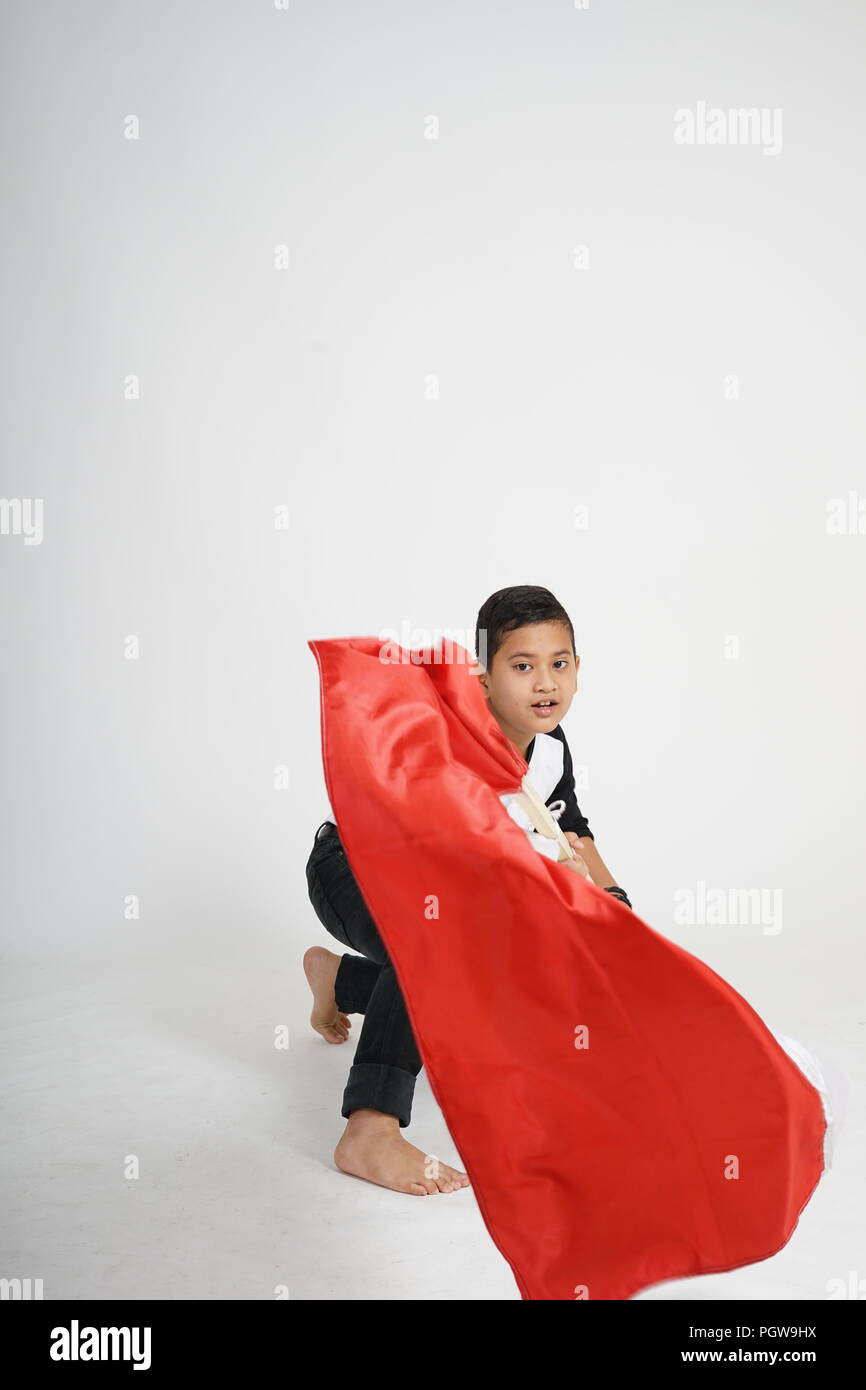 Junge mit indonesischen Flagge Erbauer Stockfoto