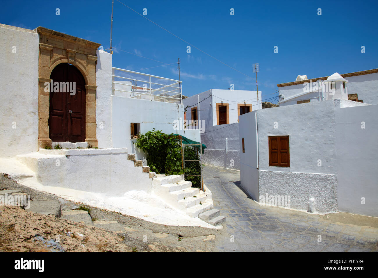 Die schöne Architektur der Stadt Lindos, Insel Rhodos, Griechenland. Urlaub in Griechenland Stadt Lindos Stockfoto