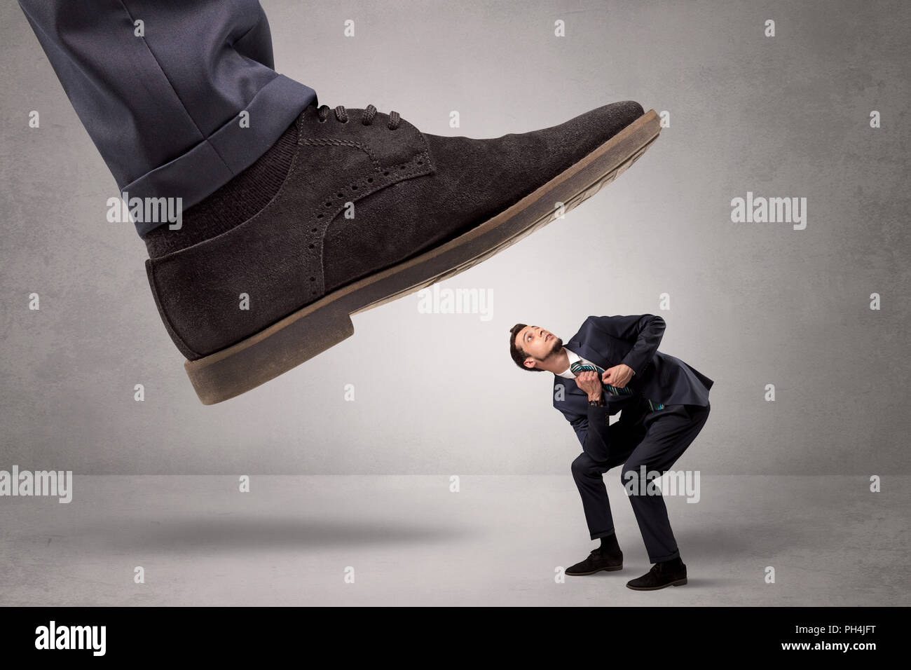 Junge Unternehmer unerhebliche illustriert von mit Füßen getreten wird, Stockfoto