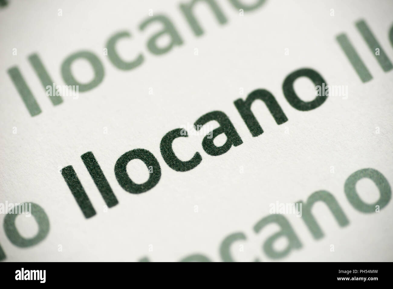 Wort Ilocano Sprache auf weißem Papier Makro gedruckt Stockfoto