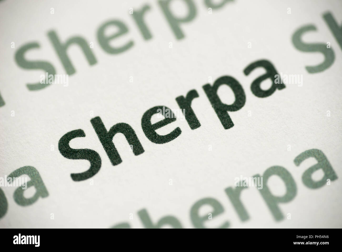 Wort Sherpa Sprache auf weißem Papier Makro gedruckt Stockfoto