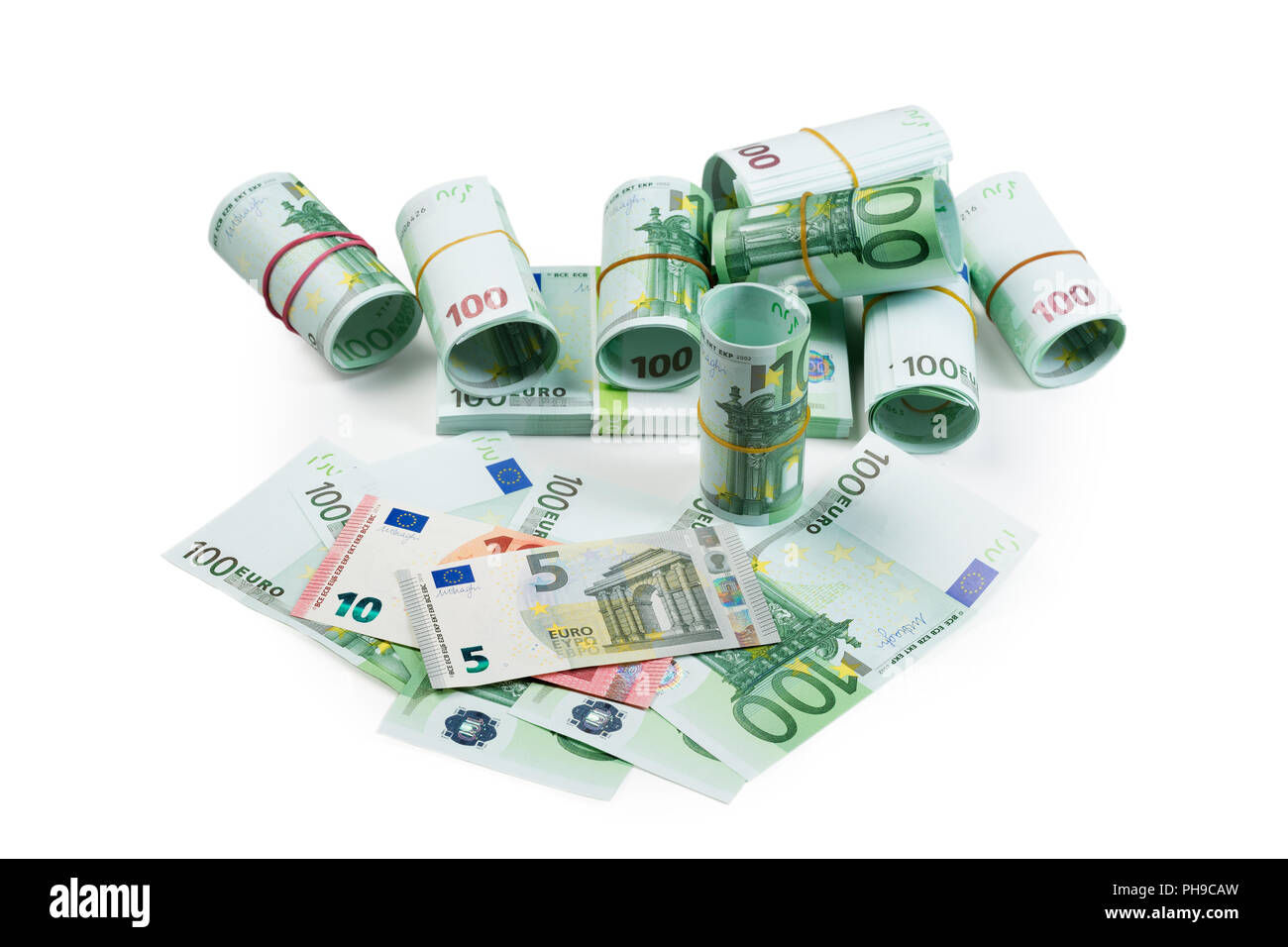 Euro-banknoten in Stapeln und Rollen Stockfoto