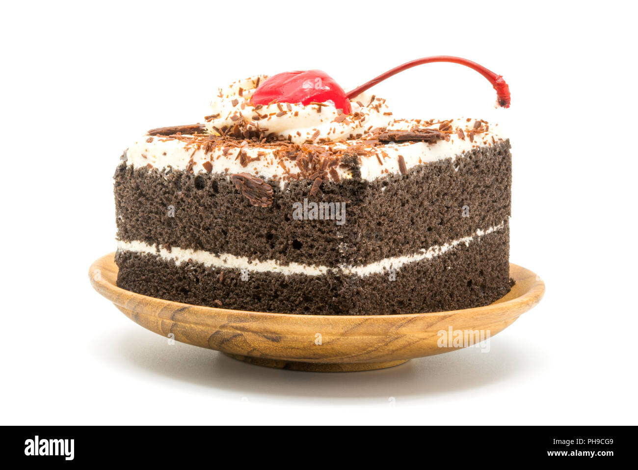 Schokolade Kuchen garniert mit Kirsche und weiße Creme Stockfoto