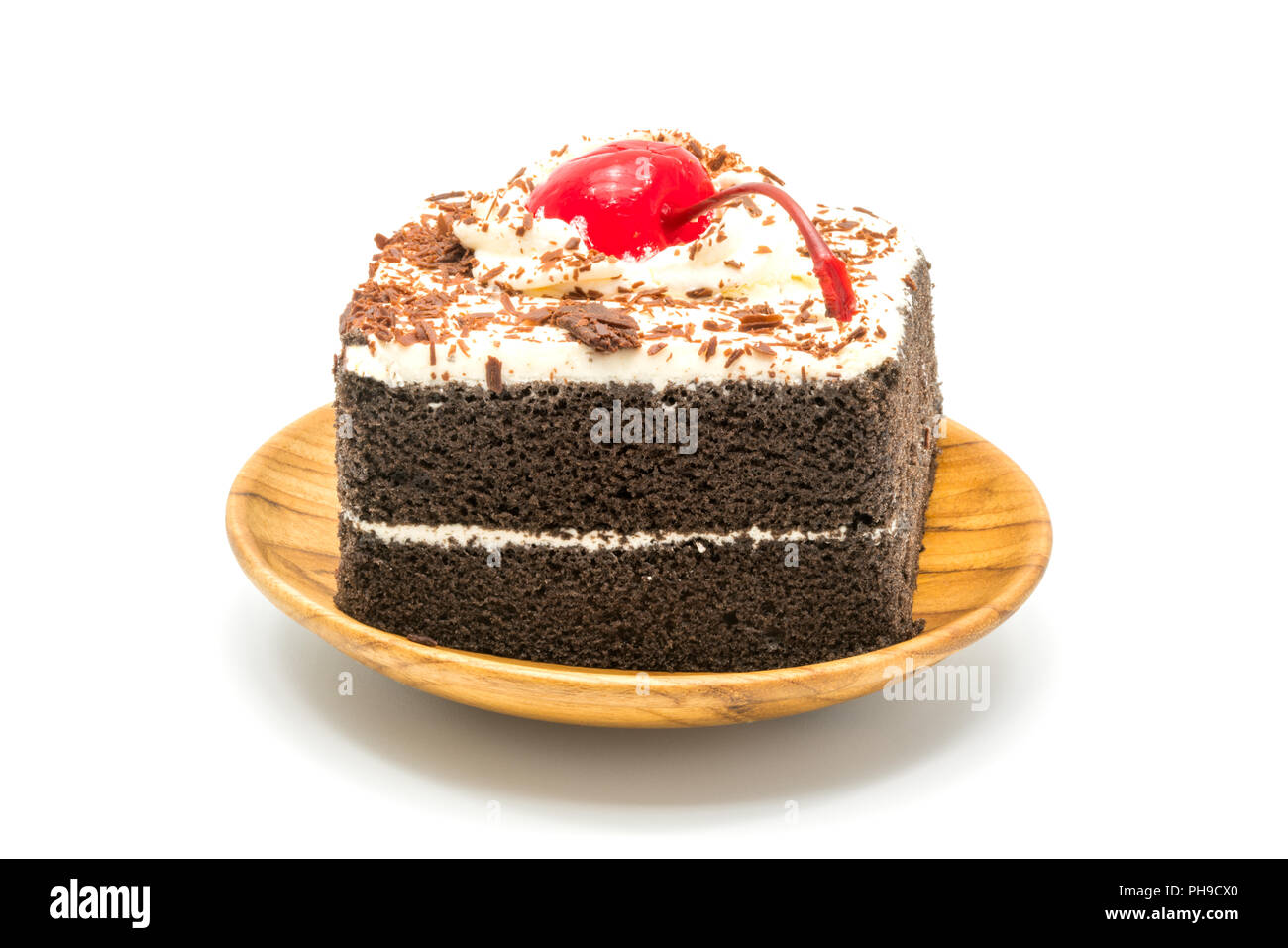 Schokolade Kuchen garniert mit Kirsche und weiße Creme Stockfoto