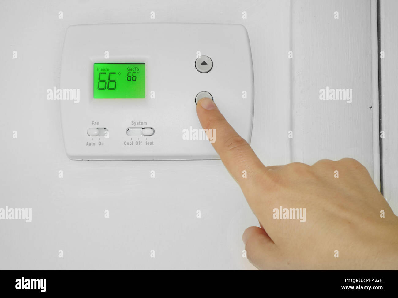 Thermostat einstellen Stockfoto