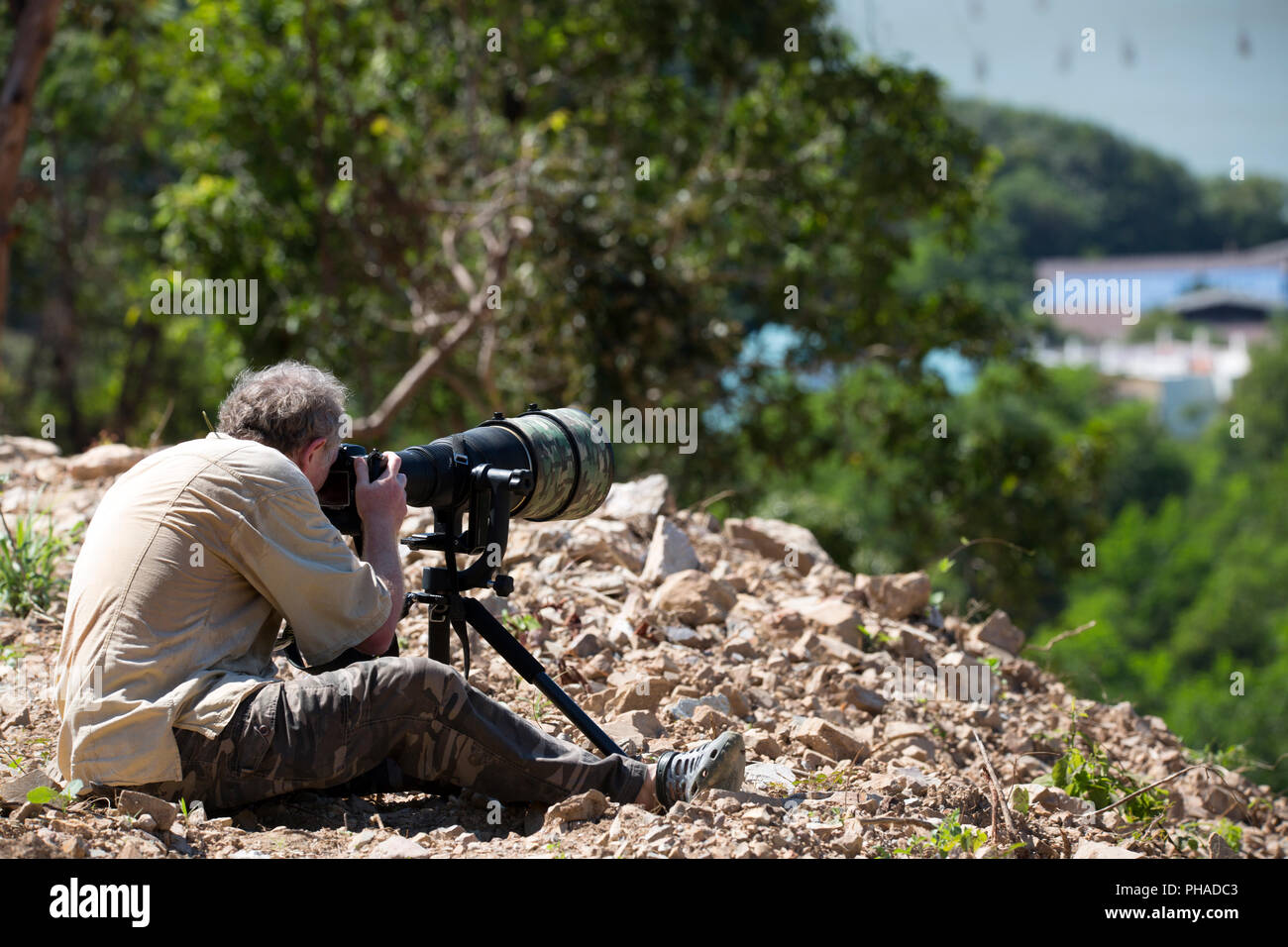 Fotograf mit einem großen Objektiv (600 mm) Stockfoto