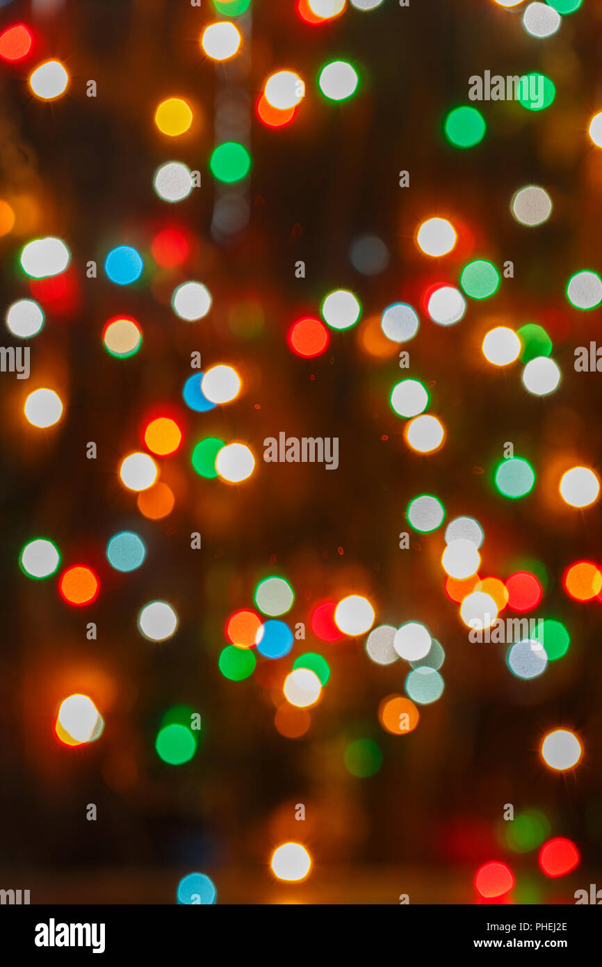 Rot, gelb, grün und blau leuchten Weihnachtsbeleuchtung. Stockfoto