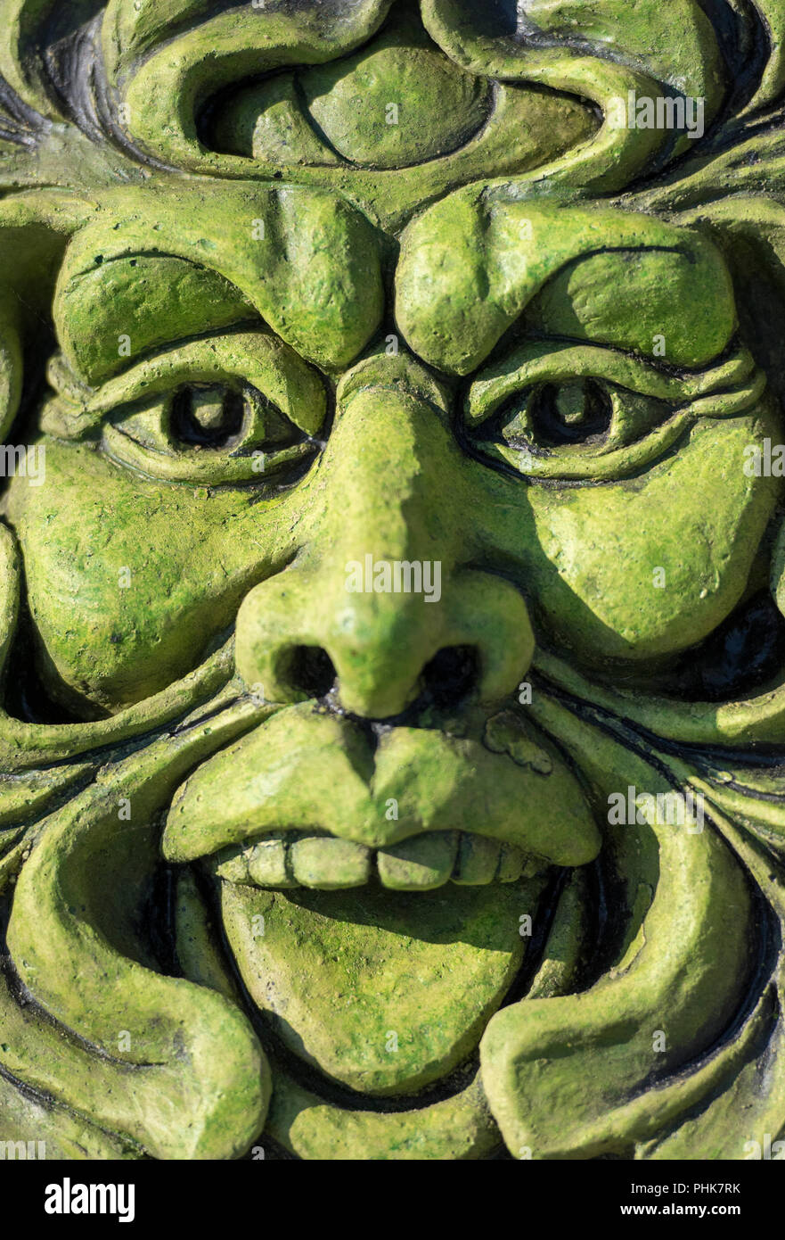 Green Man terracotta Garten Folklore dekorative Maske. Stockfoto