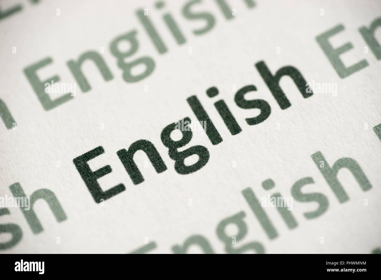 Wort in englischer Sprache auf weißem Papier Makro gedruckt Stockfoto