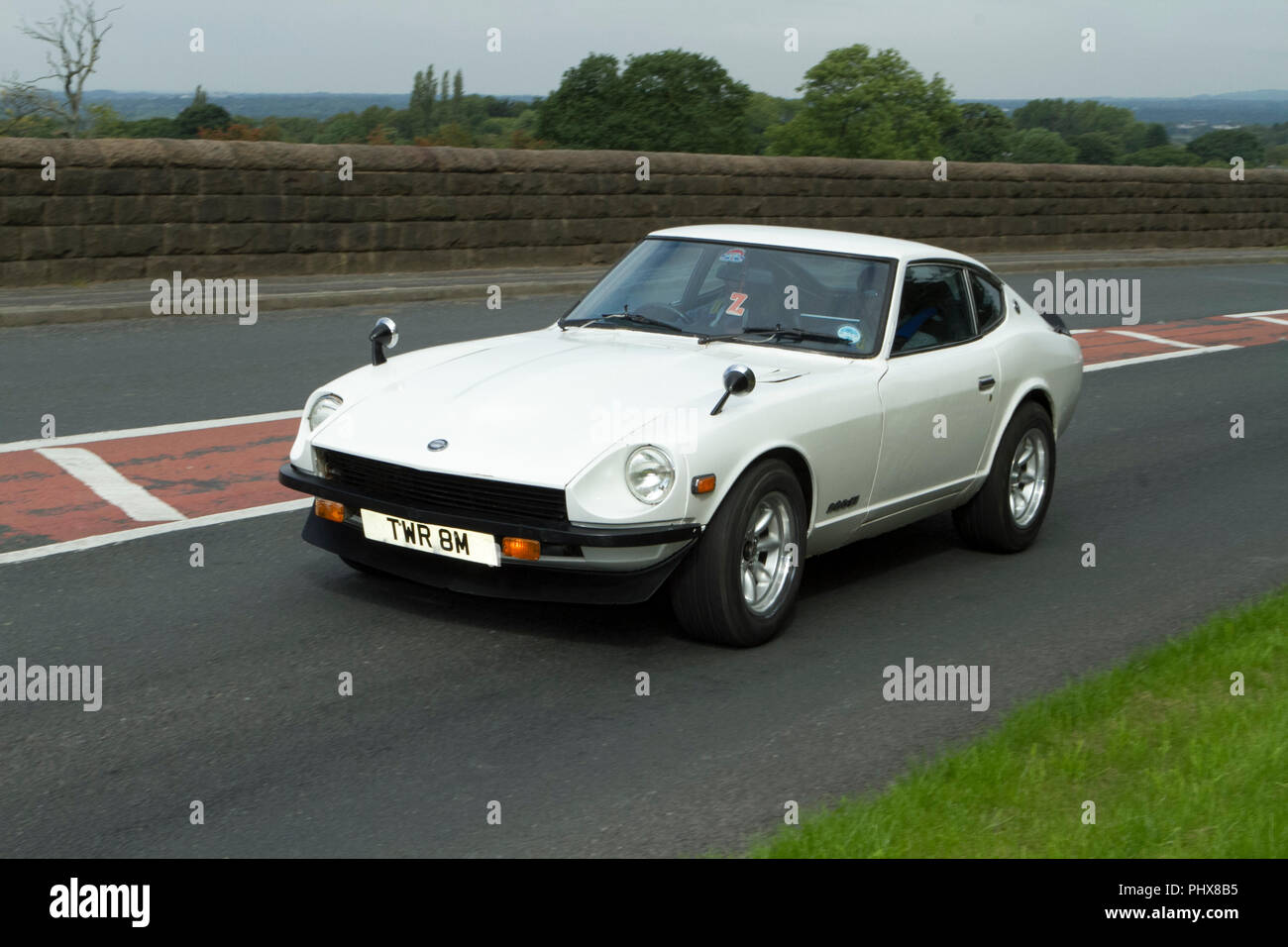 1973 Datsun 260 Z klassische Autos, Veteran, restauriert, weißes Auto, Classic, Fahrzeug, Vintage, Auto, Alte, Transport, retro, Transport, Großbritannien Stockfoto