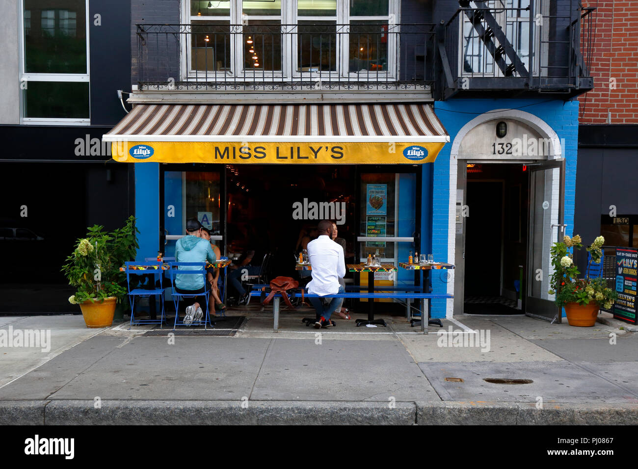 Miss Lily's, 132 W Houston St, New York, NYC, Foto eines jamaikanischen Restaurants in Manhattans Greenwich Village Viertel. Stockfoto