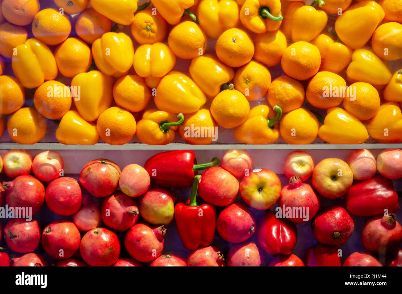 Gelbe und rote Früchte Hintergrund Stockfoto