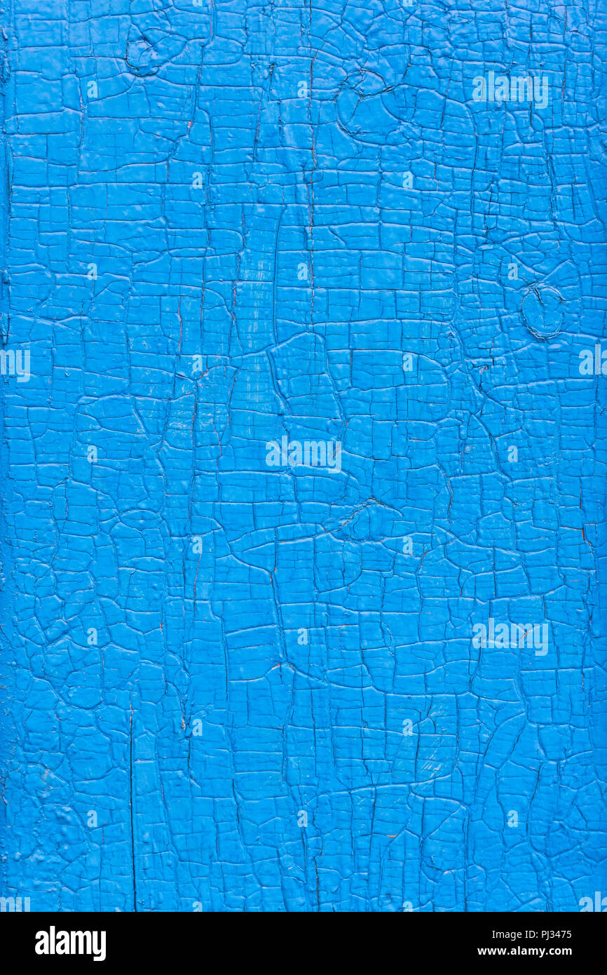 Wetter abgenutzte Holz- Textur mit Risse in blauer Farbe Stockfoto