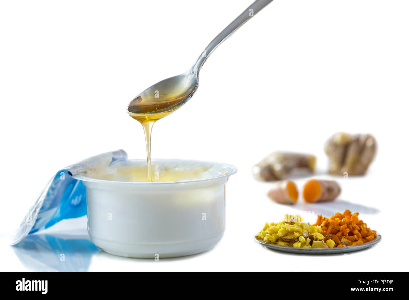 Honig Joghurt. Griechischer Joghurt mit Honig in einem Topf mit Honig Produkt Stockfoto