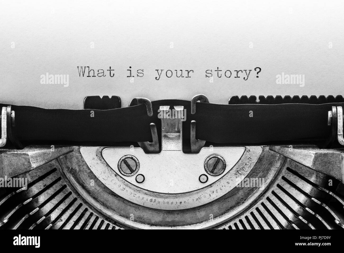 Was ist ihre Geschichte auf einer alten Schreibmaschine Stockfoto