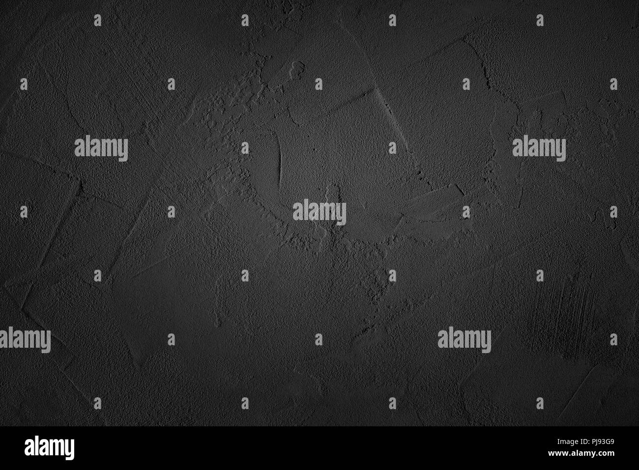 Granulare schwarze Wand Textur - dunkel strukturierten Hintergrund Stockfoto