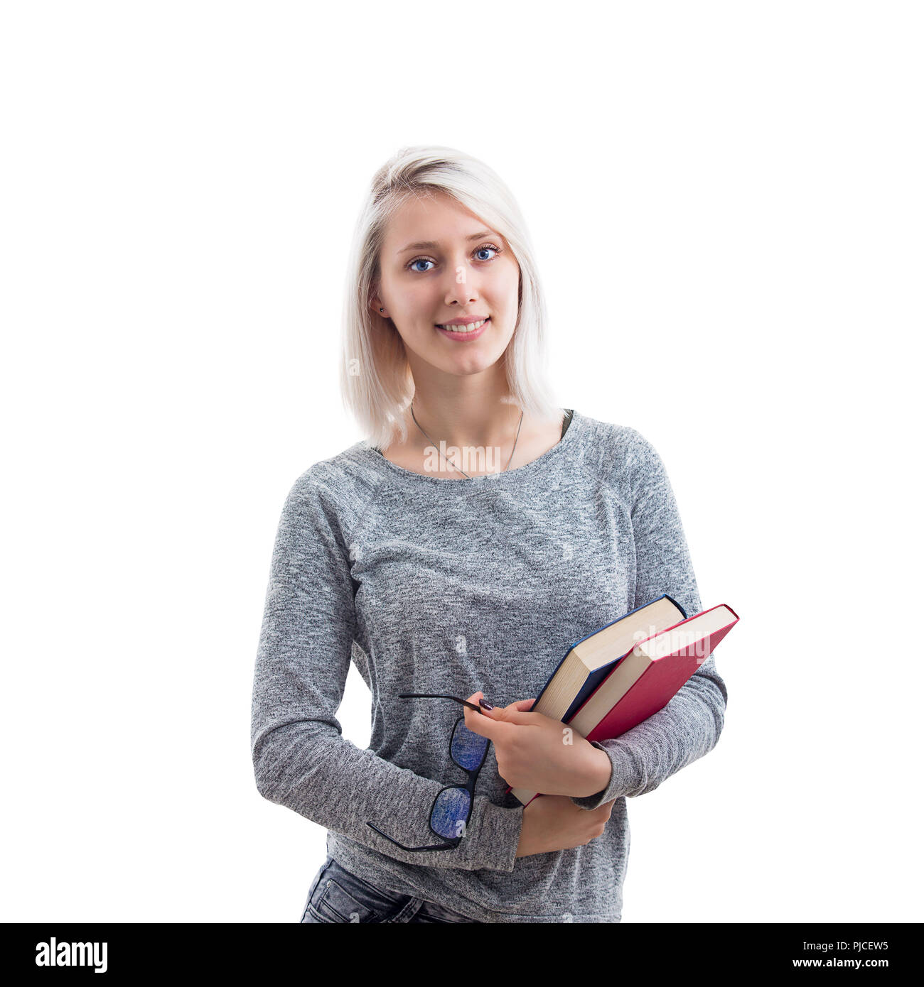 Lächelnde Frau Student, Lehrer oder business lady Holding Bücher in einer Hand und Brillen in einem anderen auf weißem Hintergrund. Stockfoto