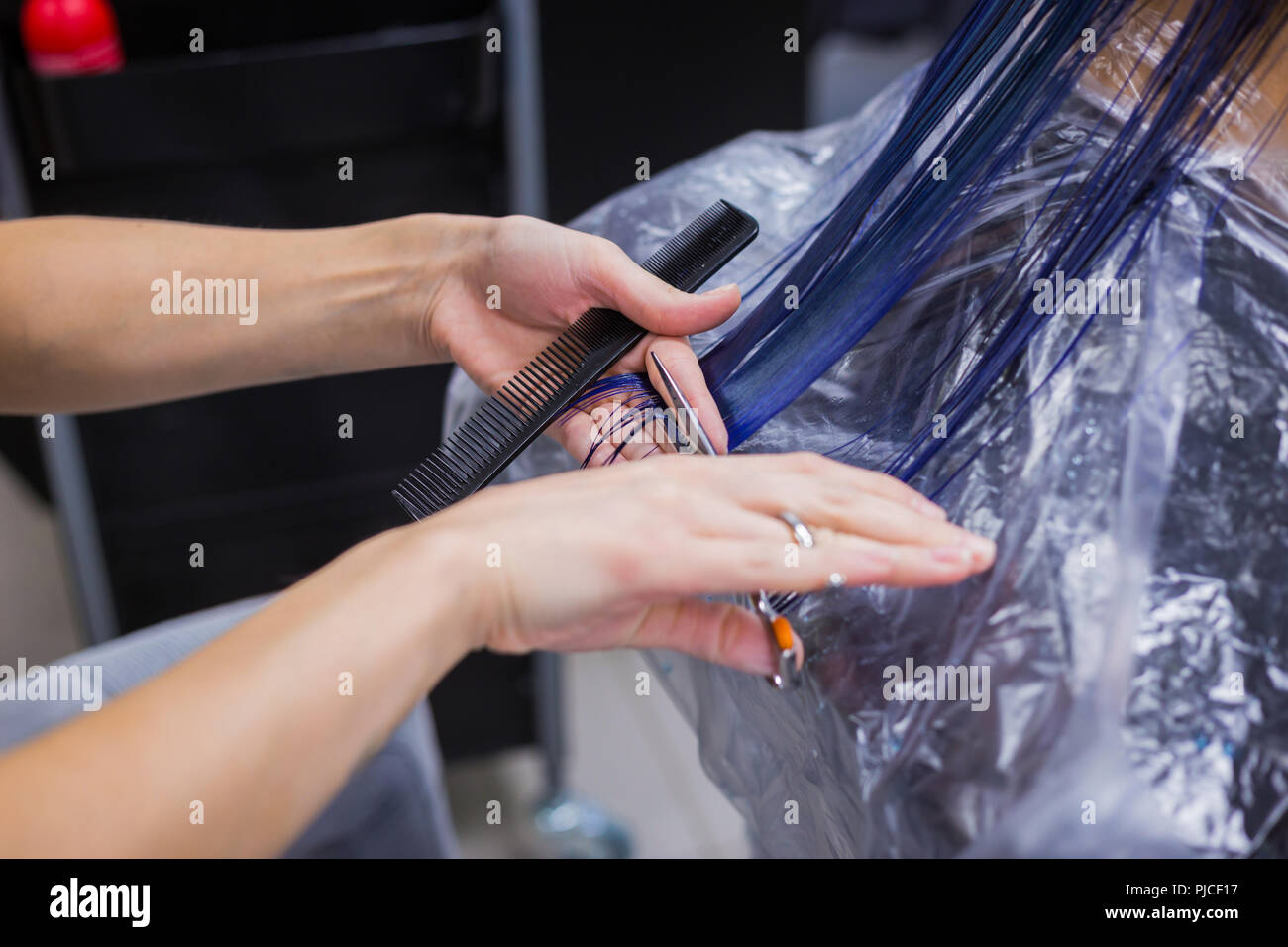 Friseur Haare schneiden von Frau client Stockfoto