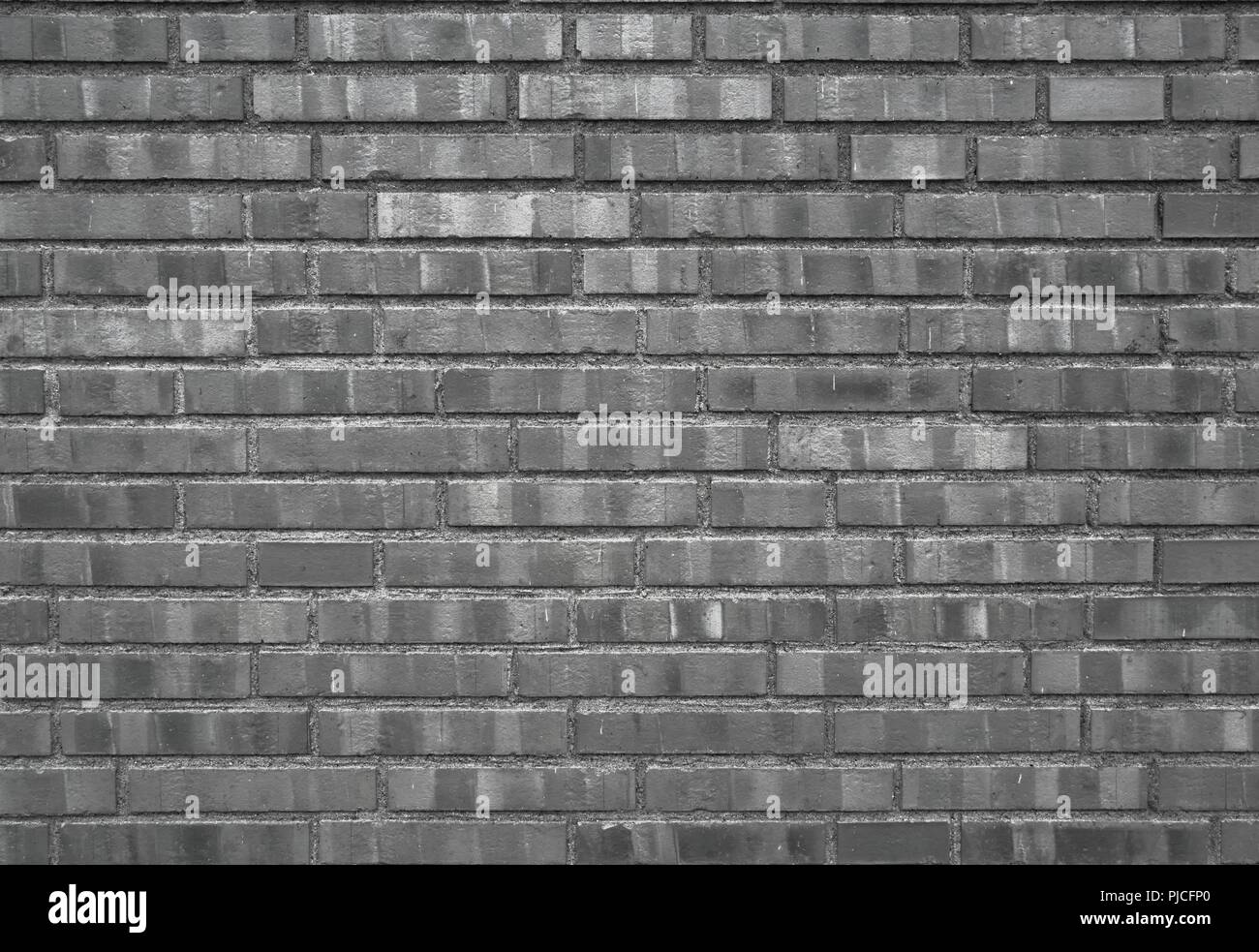 Dunkel schwarz Brickwall städtischer Hintergrund Textur. Stockfoto